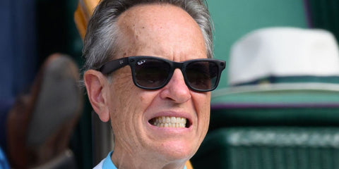 Richard e. Grant was seen wearing matte black Ray-Ban Meta Wayfarer Gen 2 RW4012 601S/T3 Polarised Smart Glasses at the Wimbledon Tennis Championships 2026.