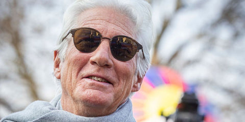 Richard Gere was seen wearing Giorgio Armani AR8215 6066/8E half-rim sunglasses at the commemoration of the Tibetan Uprising in The Hague, Netherlands, March 2025