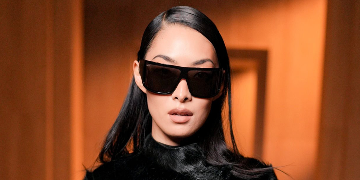 Japanese-British actress Rina Sawayama was seen wearing black Gucci GG2274S 001 shield sunglasses at the Gucci Fall/Winter 2026 fashion show during Milan Fashion Week.