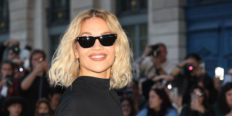 Rita Ora was seen wearing black Tom Ford Penn-02 TF1362 01A sunglasses with dark grey lenses at the Tom Ford Spring/Summer 2026 fashion show during Paris Fashion Week. Shop online now on Pretavoir