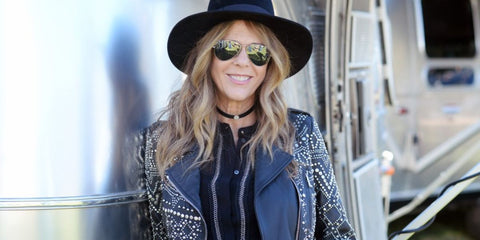 Rita Wilson was seen wearing Ray-Ban Aviator 3025 001/58 Gold Frame G15 Polarised sunglasses in a The Rolling Stone Magazine feature, February 2019.