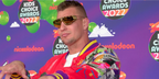 Former NFL star Rob Gronkowski was seen wearing gold Versace 2226 1002/7P shield sunglasses at the 2022 Kids Choice Awards