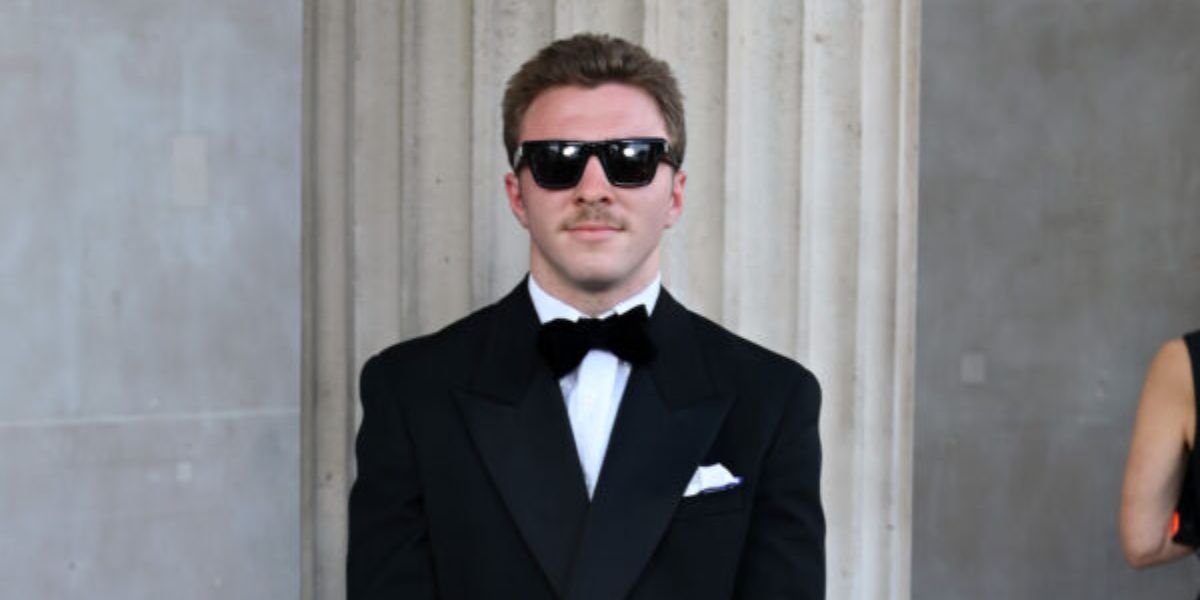 Rocco Ritchie was seen wearing Saint Laurent Sun SL 469 001 square sunglasses to attend the summer party at the National Gallery in Trafalgar Square, London