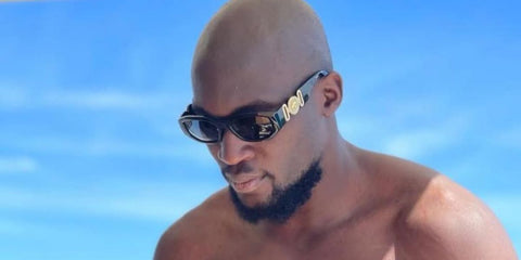 Belgian footballer Romelu Lukaku was seen wearing black Versace 4361 GB1/87 Medusa Biggie Sunglasses. Shop online now on Pretavoir
