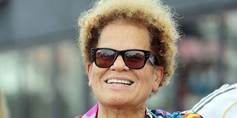 Brazilian artist Romero Britto was seen wearing havana Ray-Ban Mega Wayfarer RB 0840S 902/1A sunglasses with light violet lenses at The Legends Cup game between Barca Legends and Real Madrid Leyendas in Miami, May 2026.