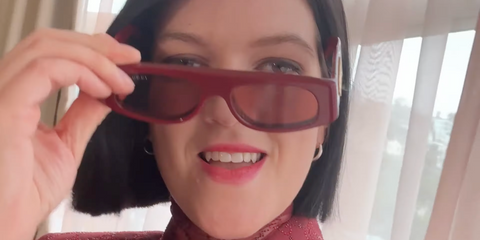 Romy Madley Croft of The xx was seen wearing red burgundy Gucci GG1771S 003 sunglasses ahead of the Grammy Awards 2024.