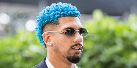 Uruguayan footballer Ronald Araujo was seen wearing silver Cartier CT0439S 007 rimless sunglasses with grey wood temples and blue gradient lenses ahead of the FIFA World Cup 2026 Group Stage match against Saudi Arabia, June 2026.