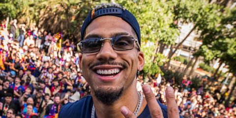 Uruguayan footballer Ronald Araujo was seen wearing silver Cartier CT0582S 004 with grey wood temples in his Instagram post, May 2026.