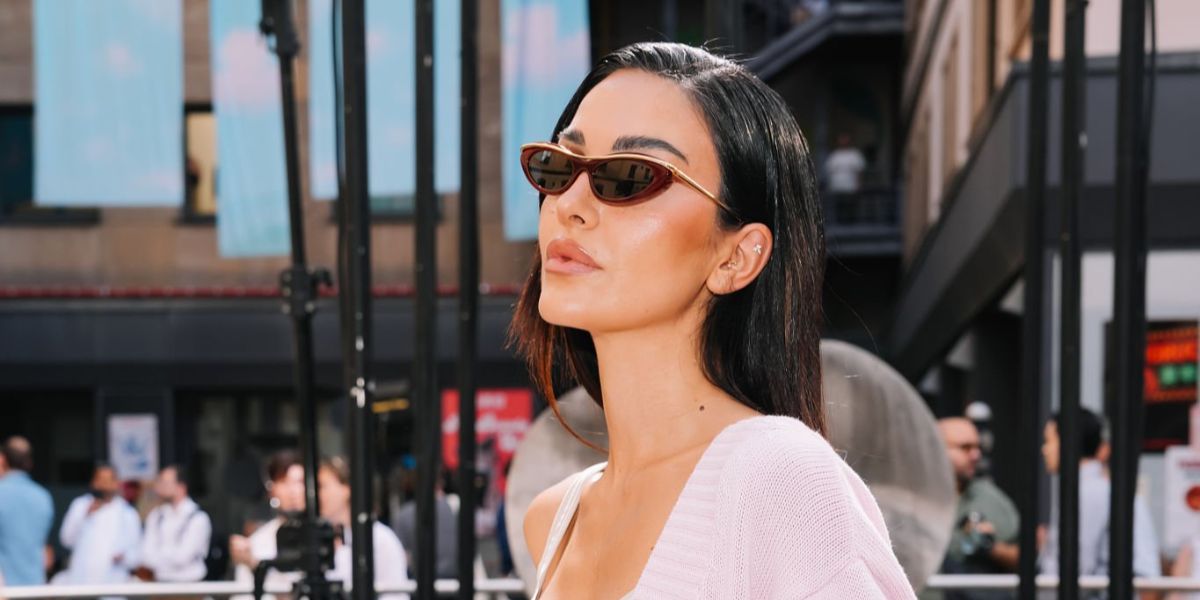 Italian fashion influencer Rosa Perrotta was seen wearing red burgundy Loewe LW40166I 66A sunglasses at the Fiorucci Menswear Sping/Summer 2026 fashion show during Milan Men's Fashion Week