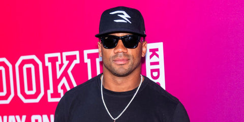 Russell Wilson was seen wearing black Ray-Ban Wayfarer Puffer RB 4940 601/87 sunglasses at the Macy's And Rookie In The City Fashion Show in NewYork City, September 2025