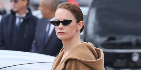 Actress Ruth Wilson was seen wearing black and gold Loewe Signature LW40166I 01A cat eye sunglasses at the Loewe Spring/Summer 2025 fashion show during Paris Fashion Week. Shop online now on Pretavoir