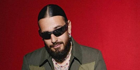 French rapper SCH was seen wearing black Gucci GG1958S 001 sunglasses in the December 2025 issue of Icon magazine, France.