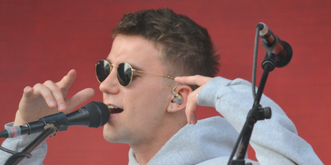 Singer and music producer SG Lewis was seen wearing gold Ray-Ban Round Metal 3447 001 sunglasses
