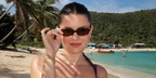 French-Romanian influencer and journalist Sabina Socol was seen wearing tortoiseshell Miu Miu Regard MU 11ZS VAU2Z1 rectangular sunglasses with brown lenses in her Instagram post, March 2025. Shop online now on Pretavoir