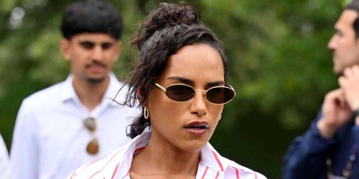 Saffron Hocking was seen wearing gold Bottega Veneta Sardine BV1386S 001 sunglasses with brown lenses at the Wimbledon Tennis Championships 2025. Shop online now on Pretavoir