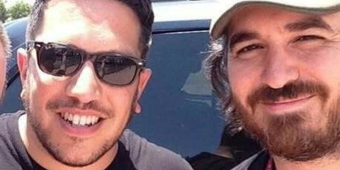 Comedian Sal Vulcano, pictured with fellow comedian Brian Quinn, was seen wearing black Ray-Ban New Wayfarer 2132 901/58 Polarised sunglasses.