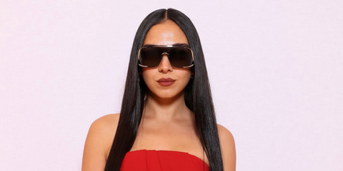 Egyptian actress Salma Abu Deif was seen wearing silver Loewe Signature LW40193U 16A shield sunglasses with grey lenses at the Loewe Spring/Summer 2026 fashion show during Paris Fashion Week.