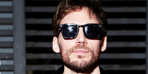 Sam Claflin wears Tom Ford Dax TF751-N/S 01A square sunglasses at the brand's Fall/Winter 2024 fashion show in Milan, Italy