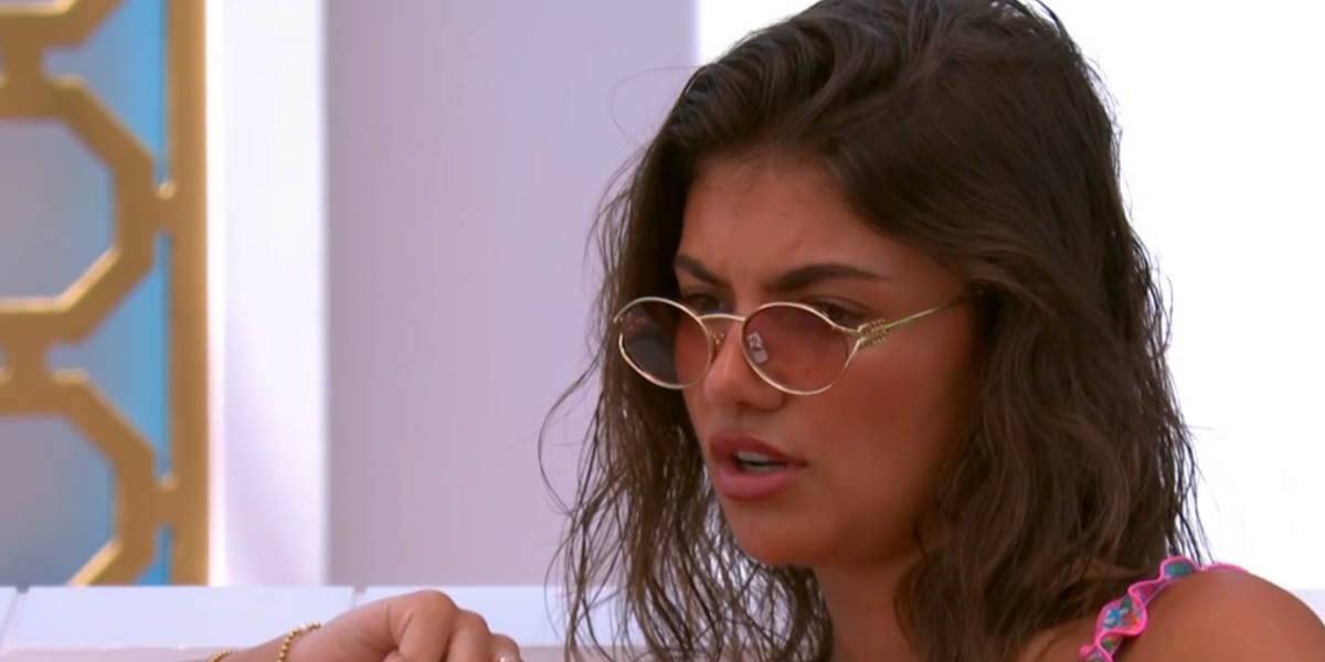Television personality Samie Elishi was seen wearing gold Miu Miu MU 52YS 5AK06S sunglasses in Love Island All Stars 2026.