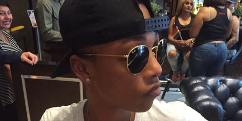 Actress Samira Wiley was seen wearing gold Ray-Ban Round Metal 3447 001 sunglasses during a Pride Parade.