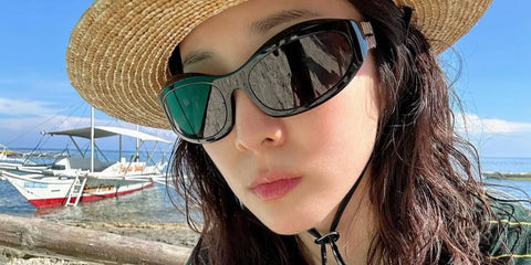 South Korean singer Sandara Park, also known as Dara, from the girl group 2NE1 was seen wearing black Miu Miu MU 14ZS 16K08Z sunglasses in Bohol, The Philippines, May 2025. Shop online now on Pretavoir