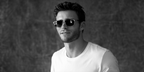 Scott Eastwood was seen wearing black and silver Persol 3327S 95/31 half-rim sunglasses in the brand's 2015 campaign
