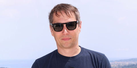 Director Sean Baker was seen wearing black Persol Elio 3333S 95/31 sunglasses at the Cannes Film Festival 2025.