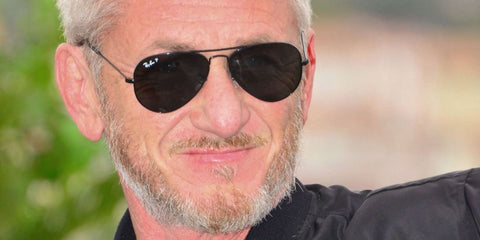 Sean Penn was seen wearing black Ray-Ban Aviator Large Metal RB 3025 002/48 Polarised sunglasses at the 'Black Flies' photo call during Cannes Film Festival 2023