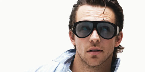 Actor Sebastiano PIgazzi was seen wearing black Tom Ford Bronson TF1044 01V sunglasses with blue lenses in a The Rakish Gent digital magazine feature, August 2026.