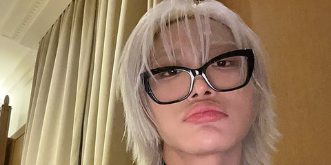 South Korean singer Seonghwa of K-Pop group ATEEZ was seen wearing black Saint Laurent SL M117 001 optical glasses in his Instagram post, February 2025.