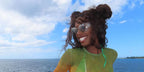 Television personality Serena Page of Love Island USA was seen wearing silver Miu Miu Rimless Runway MU 54YS 1BC10F sunglasses with light ivory lenses in Barbados, shared through her Instagram post in March 2025.