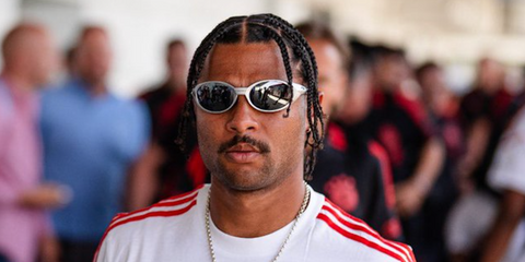 German footballer Serge Gnabry of Bayern Munich F.C. was seen wearing silver Oakley Eye Jacket Redux OO9438 05 Prizm Polarised sunglasses in 2022.