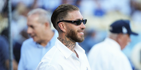 Professional soccer player Sergio Ramos was seen wearing black Prada PR B06S 16K08Z sunglasses at Dodger Stadium in Los Angeles, June 2025. Shop online now on Pretavoir
