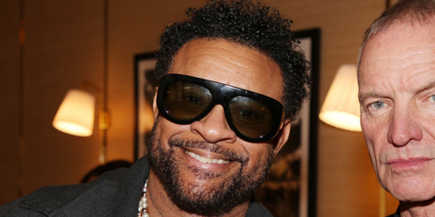 Reggae icon Shaggy, pictured with Sting, was seen wearing black Bottega Veneta BV1362S 006 sunglasses with green lenses during a photo call for the Metropolitan Opera production of Sting's "The Last Ship" in New York City, March 2026.
