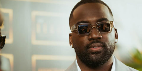 Canadian actor Shamier Anderson was seen wearing transparent beige Saint Laurent Sun SL 572 003 sunglasses at The Legacy Awards 2023. Shop online now on Pretavoir