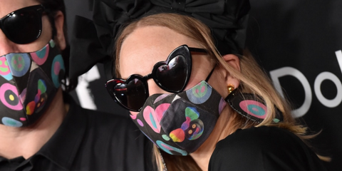 Australian singer Sia was seen wearing black heart-shaped Saint Laurent Sun SL 181 LouLou 001 sunglasses. Shop online now on Pretavoir