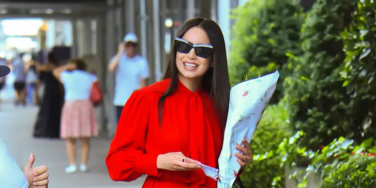 Sofia Carson was seen wearing black Loewe Anagram LW40036I 01A cat eye sunglasses in New York City