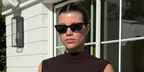 Sofia Richie was seen wearing black Ray-Ban Lady Burbank RB 2299 901/31 sunglasses in her Instagram post, December 2025.