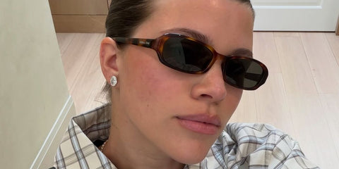 Sofia Richie was seen wearing tortoise Saint Laurent Sun SL 872 Erin 004 sunglasses with grey lenses in her Instagram post, June 2026.