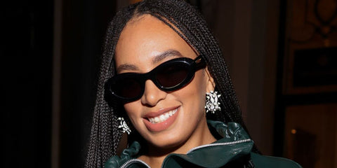 Solange Knowles was seen wearing black Bottega Veneta BV1191S 001 sunglasses during Milan Fashion Week. season Spring/Summer 2023. Shop online now on Pretavoir