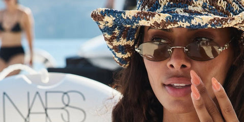 Television personality Sophie Piper of Love Island was seen wearing silver Miu Miu MU A54S 1BC90Q oval sunglasses in her Instagram post, July 2025.