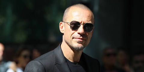 Italian actor Stefano Accorsi was seen wearing gunmetal Giorgio Armani AR6104 3003/87 square sunglasses at the Mortuary Chapel of Giorgio Armani, September 2025.