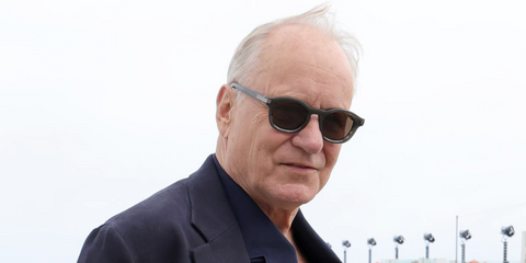 Stellan Skarsgard was seen wearing grey Zegna EZ0229/S 20J sunglasses with brown lenses at the Zegna Summer 2027 show in Los Angeles, June 2026.