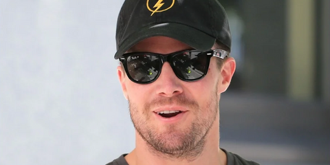 Canadian actor Stephen Amell was seen wearing black Ray-Ban Folding Wayfarer 4105 601/58 Polarised sunglasses in Vancouver, July 2014.