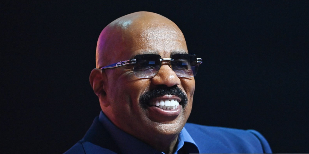 Steve Harvey was seen wearing antique silver Dita Meta Evo One DTS 147 02 sunglasses with blue gradient lenses onstage during Invest Fest 2026 in Atlanta, Georgia.