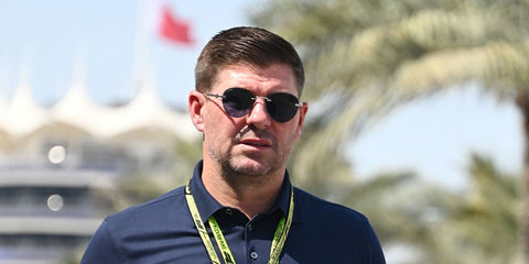Football icon Steven Gerrard was seen wearing silver Cartier CT0331S 001 round rimless sunglasses with blue lenses at the F1 Grand Prix of Bahrain 2025. Shop online now on Pretavoir