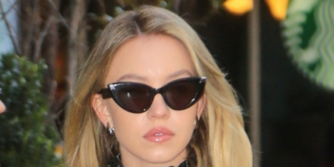 Sydney Sweeney wearing black acetate Alexander McQueen Sunglasses