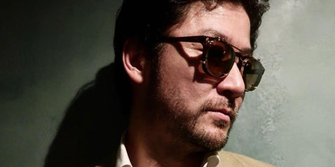Japanese actor Tadanobu Asano was seen wearing Garrett Leight Ace and Garrett Leight Langley Clip 5156 G/EM Flip-Up Clip On in his Facebook post