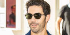 French-Algerian actor Tahar Rahim was seen wearing dark tortoiseshell Ray-Ban John RB 2194 902/31 sunglasses with green lenses to the Jury Dinner during the 74th Cannes Film Festival