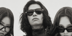 South Korean rapper Tarzzan of AllDay Project was seen wearing black Bottega Veneta BV1418S 005 Knot sunglasses in a Vogue Korea feature, July 2025.